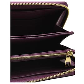 Louis Vuitton-Portefeuille Zippy en relief monogramme violet Louis Vuitton-Violet
