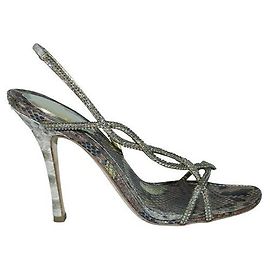 Rene Caovilla – Goldene Pumps aus Schlangenleder Andere
