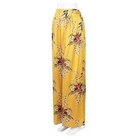 Autre Marque-Pantaloni del pigiama in raso di seta con stampa floreale a vita alta e gamba larga Johanna Ortiz-Giallo