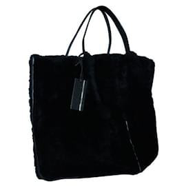Autre Marque-ZEITGENÖSSISCHE DESIGNER-Tasche aus schwarzem Fell mit Besatz aus Lammleder-Schwarz