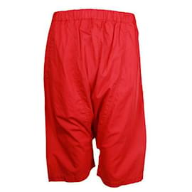 Comme Des Garcons-Pantaloni Comme Des Garcons in cotone rosso con gamba abbassata-Rosso