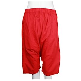 Comme Des Garcons-Pantalones rojos de algodón con caída en el interior de la pernera de Comme Des Garcons-Roja