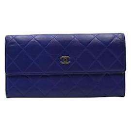 Chanel-Portafoglio Chanel in pelle di caviale trapuntata blu-Blu