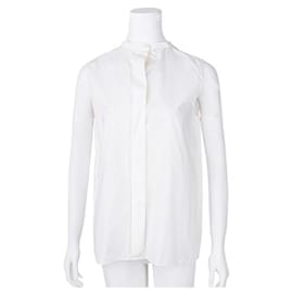 Hermès-Top smanicato a collo alto HERMÈS-Bianco