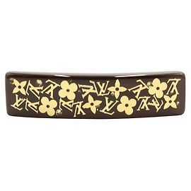 Fermaglio per capelli Louis Vuitton in resina marrone e oro Marrone