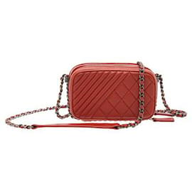 Chanel-Bolsa para câmera Chanel Coco Boy Mini de couro acolchoado-Vermelho