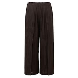 Issey Miyake-Pantalones plisados-Castaño