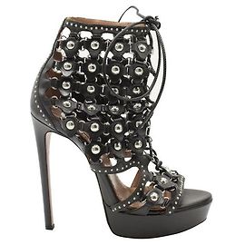 Alaïa Punta aperta con lacci in pelle nera con borchie Nero