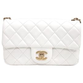 Chanel-Chanel Mini bolso bandolera clásico Golden Ball New de piel de cordero-Blanco