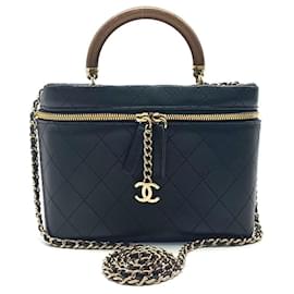 Chanel-Tote cosmetica e borsa a tracolla Chanel-Marrone,Nero