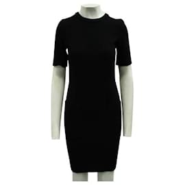 Autre Marque-Petite robe noire en laine noire de créateur contemporain avec poches-Noir