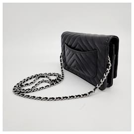 Chanel-Mini borsa a tracolla Chanel Caviar Chevron WOC-Nero