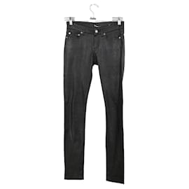 Saint Laurent-Pantalones ajustados de algodón-Negro
