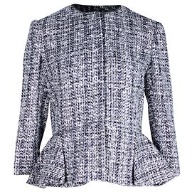 Alexander McQueen Tweedjacke mit Schößchensaum aus schwarzer Baumwolle Weiß