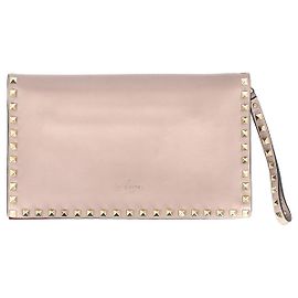 Valentino Garavani Valentino Rockstud Wristlet Clutch in Blush Pink Leather  Pink