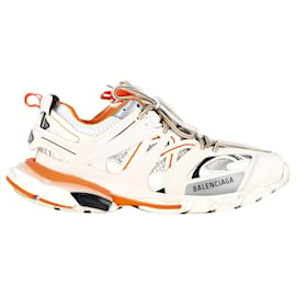 Balenciaga-Balenciaga Track Sneakers aus weißem und orangefarbenem Polyurethan. -Weiß