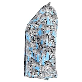 Michael Kors-Michael Kors – Bluse mit Knopfleiste und Zebra-Print aus blauer Seide-Blau