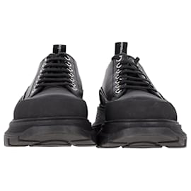 Alexander Mcqueen-Alexander McQueen Tread Slick Sneakers aus schwarzem Leder-Schwarz