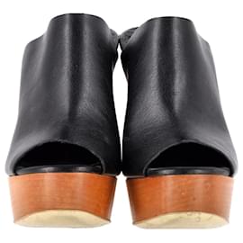 Stella Mc Cartney-Stella McCartney Wood Platform Mules in Black Faux Leather -Black