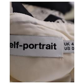 Self portrait-Top con volantes y peplum de poliamida color marfil de Self-Portrait-Blanco,Crudo