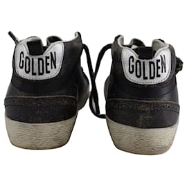 Golden Goose-Zapatillas Golden Goose Mid Star de gamuza con parte superior brillante y espuelas en cuero negro-Negro