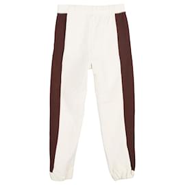 Ganni-Pantaloni sportivi a righe Ganni Software Block Isoli in misto cotone organico color crema-Bianco,Crudo
