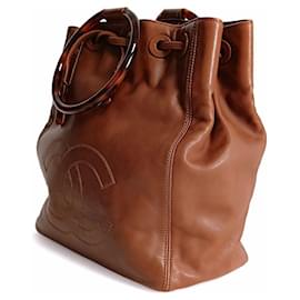 Chanel-Chanel bucket style handbag with drawstring in leather and bone-Brown