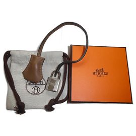 bell, pull tab, and new Hermès lock for Hermès bag, box and dustbag Light brown
