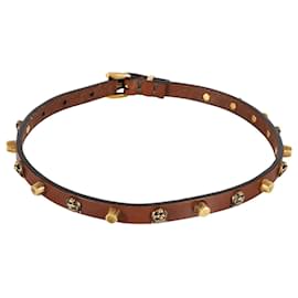 Gucci-Gucci-Halsband aus braunem Leder mit Katzenkopf und Nieten in Goldton-Metallisch