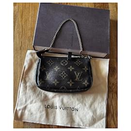 Louis Vuitton-Mini bolsito accesorio Monogram-Castaño