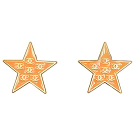 Chanel-Orecchini a clip Chanel in oro smaltato CC Star-D'oro