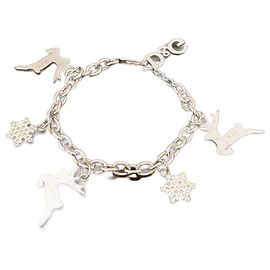 Raro bracelete vintage DOLCE & GABBANA em aço com renas e estrelas de Natal. Prata