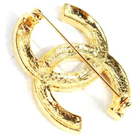 Chanel-Alfinetes e broches CHANEL T.  metal-Dourado