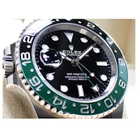 Rolex-ROLEX GMT MasterII Linkshänder grün/ schwarze Lünette Oyster-Armband Ref .126720VTNR Herren-Silber