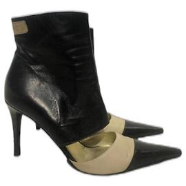 Botas Chanel de couro preto e bege Preto Bege