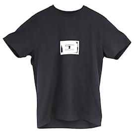 Givenchy-T-shirt con logo stampato di Givenchy in jersey di cotone nero-Nero