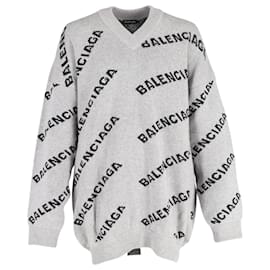 Balenciaga-Maglione girocollo con logo jacquard all-over di Balenciaga in lana grigia-Grigio