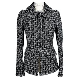 Chanel-Veste en tweed noire avec boutons CC à 9 000 $.-Noir