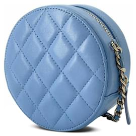 Chanel-Pochette ronde en cuir d'agneau matelassé Chanel bleue avec sac à bandoulière en chaîne-Bleu