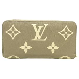 Louis Vuitton-Cartera con cremallera bicolor Empreinte gigante con monograma Louis Vuitton marrón-Castaño