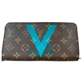 Louis Vuitton-Cartera con cremallera de edición limitada en color turquesa.-Turquesa