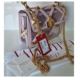 Valentino-VALENTINO GARAVANI Roman Stud medium handbag in pastel pink polymeric material and leather.-Pink,Other