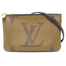 Louis Vuitton-Pochette con cremallera y forro inverso gigante con monograma-Castaño