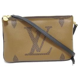 Louis Vuitton-Pochette gigante con zip foderata al contrario con monogramma-Marrone