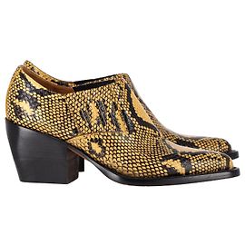 Chloé Botines Rylee con relieve de piel de serpiente Chloe en cuero amarillo Amarillo