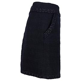 Chanel-Chanel Minirock mit Kettendetail aus schwarzem Tweed-Schwarz
