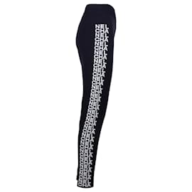 Chanel-Pantaloni slim Chanel con logo laterale in lana nera-Nero