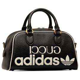 Gucci-Schwarze Gucci x Adidas Mini-Reisetasche aus Leder-Schwarz