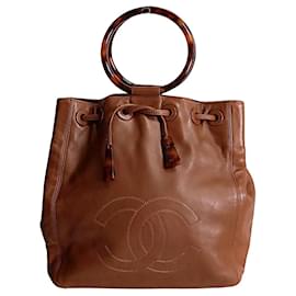 Chanel-Chanel Chanel bucket style handbag with drawstring in leather and bone-Brown