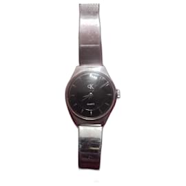 Calvin Klein-Relógio de pulso analógico feminino vintage dos anos 90-Prata